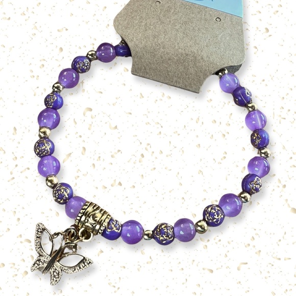 Purple glass and acrylic beads purple stretchy bracelet with gold accents - Picture 1 of 3